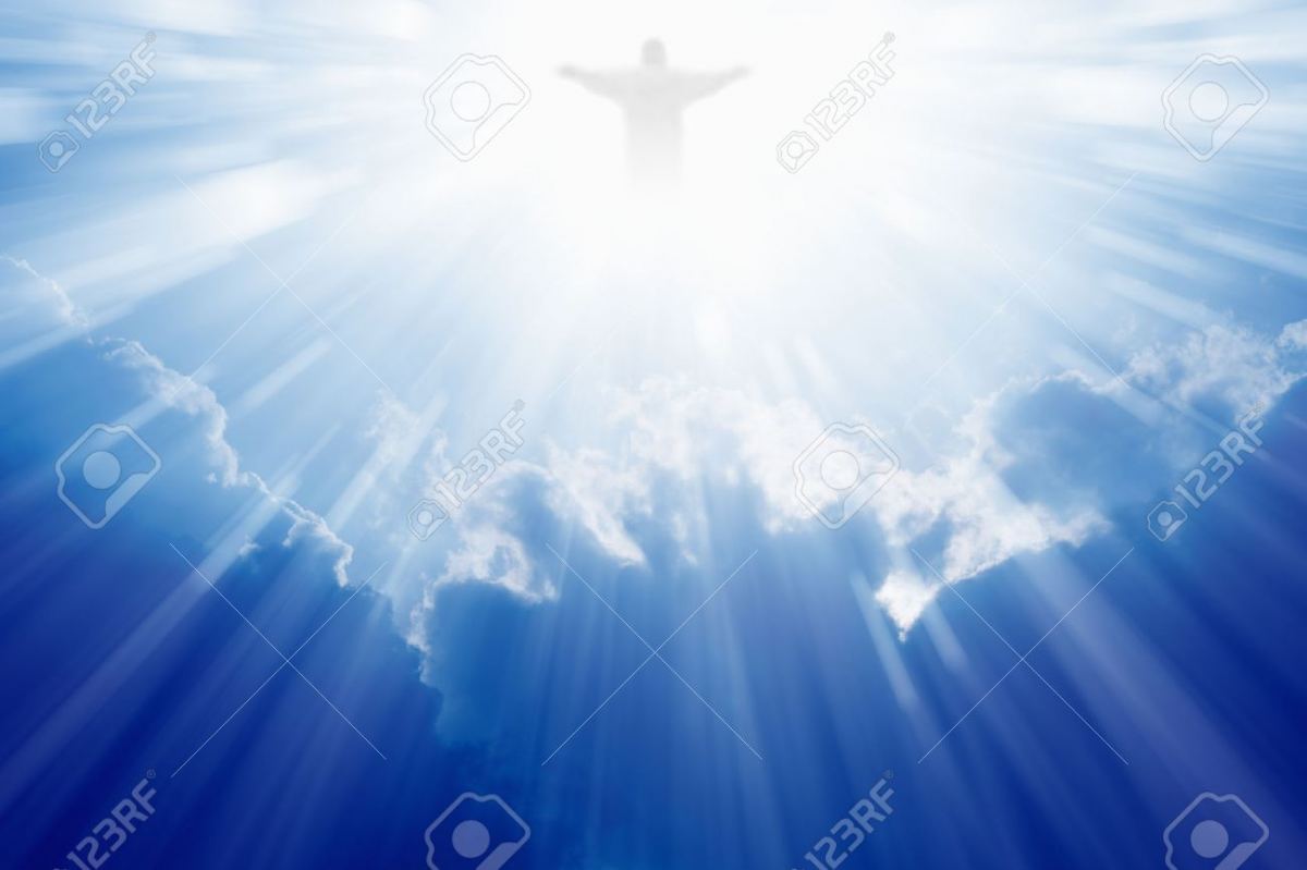 25445617 bright light of jesus christ in blue sky with clouds