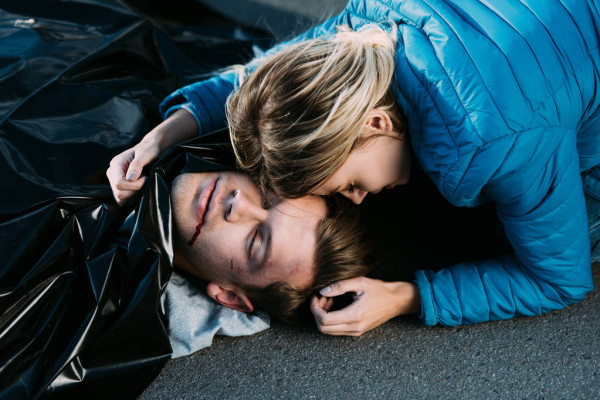 depositphotos 222607032 stock photo young woman crying hugging dead